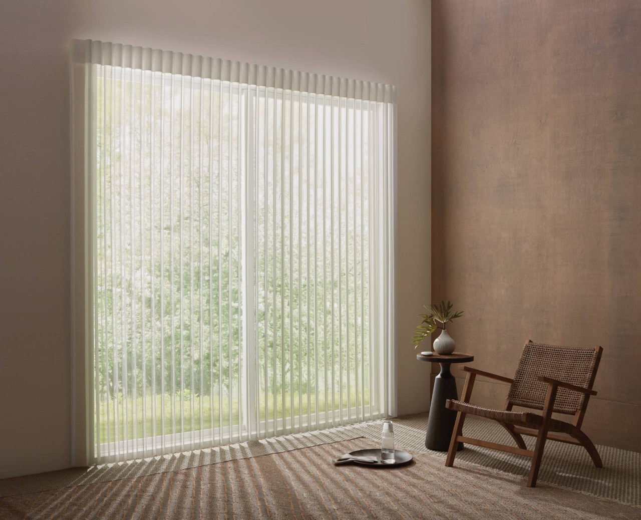 Hunter Douglas Luminette® Sheer Panels on a Sliding Glass Door in a Seating Area at Midwest Blind & Shades near Mishawaka, Indiana